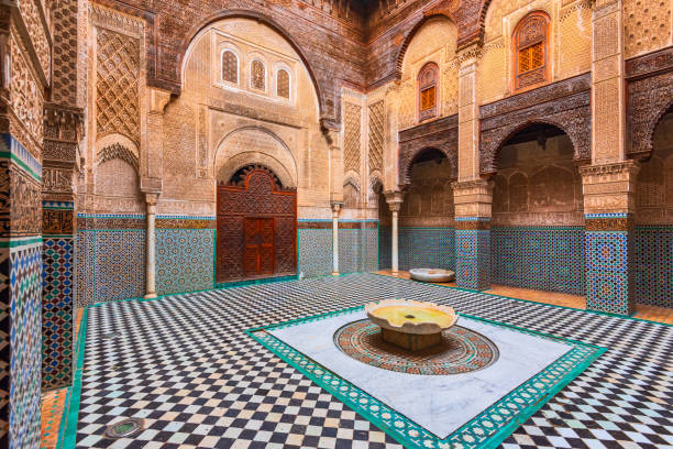 Fes, Morocco. The courtyard of Al-Attarine Madrasa of the perfumers, built by Marinid sultans in 14h Century in the medina of Fez