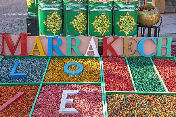 Colourful dried flowers with the inscription Love Marrakech in a market in Marrakech. Morocco.